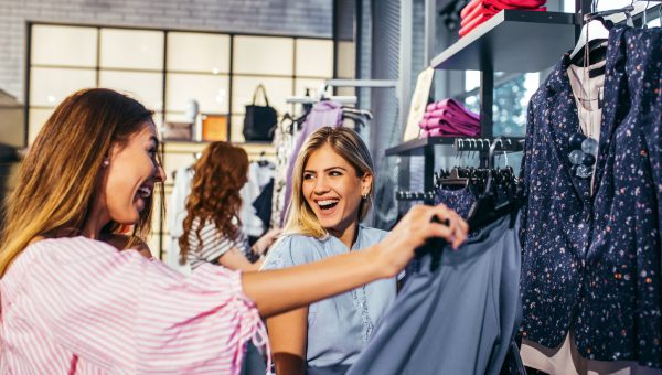 Shot of two friends shopping together in the store.